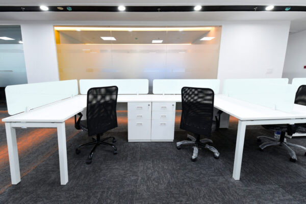 custom ergonomic office chairs with white desks in a modern workspace setup by vlite furnitech