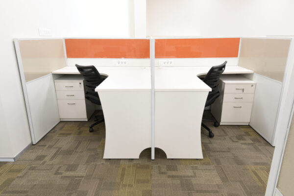 white-office-desks-with-black-custom-made-chairs-in-a-compact-workspace-setup-by-vlite-furniture