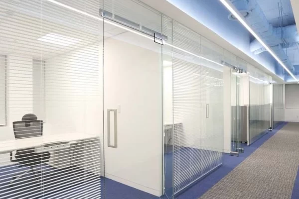 Blue color carpet in a glass partition