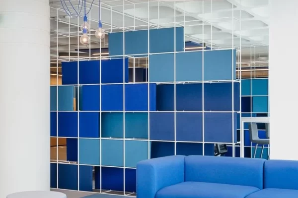 Blue color office break out area with blue couch