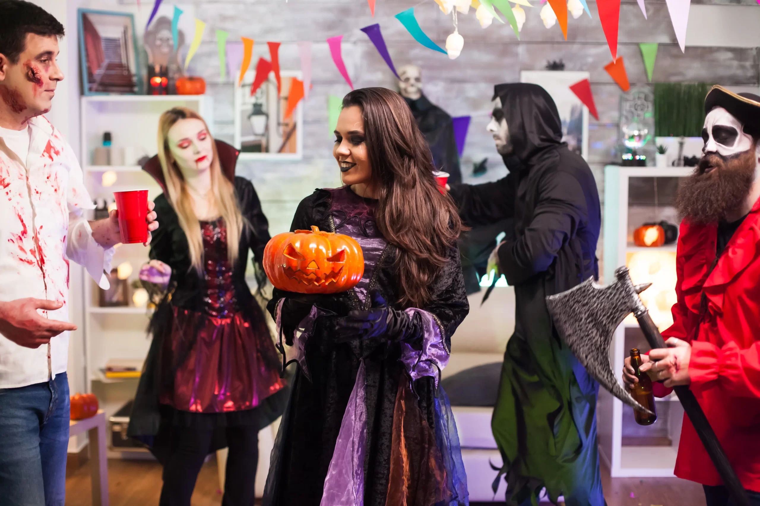 Halloween office party cheerful woman with a witch costume