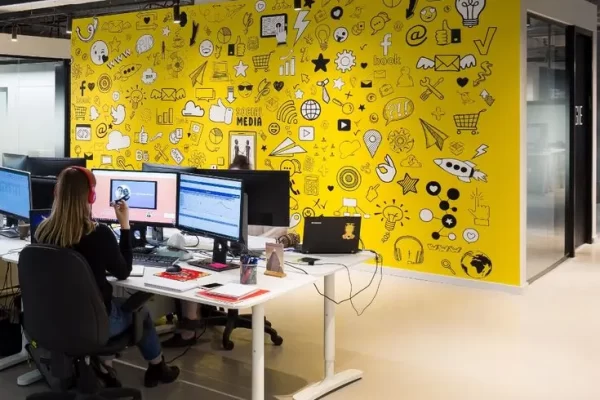 Yellow wall with the unique prints on it