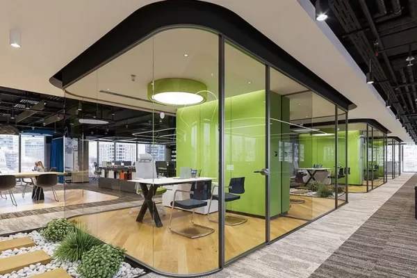 Green color pillars in glass partition cabin