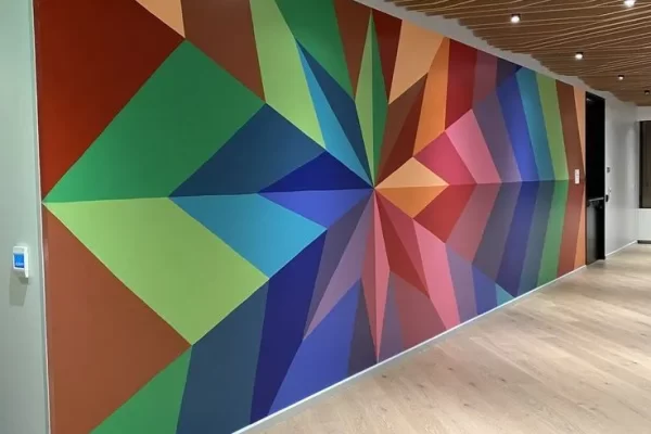 Office walls with colorfull geometric pattern.webp