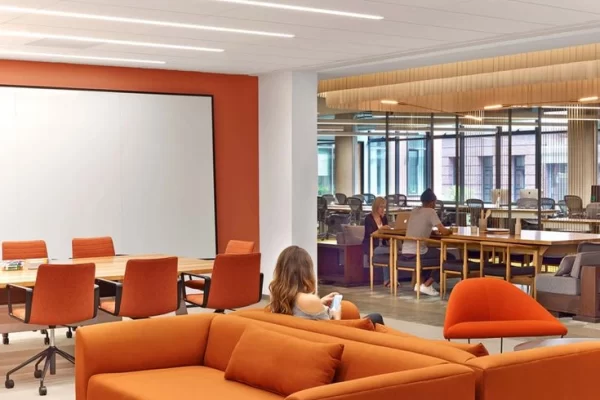 Orange Themed workspace and breakout area