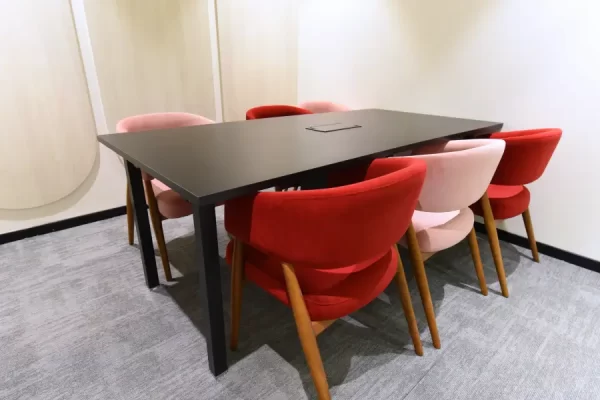 YesssWorks Coworking Meeting Table with Red Chairs Photos